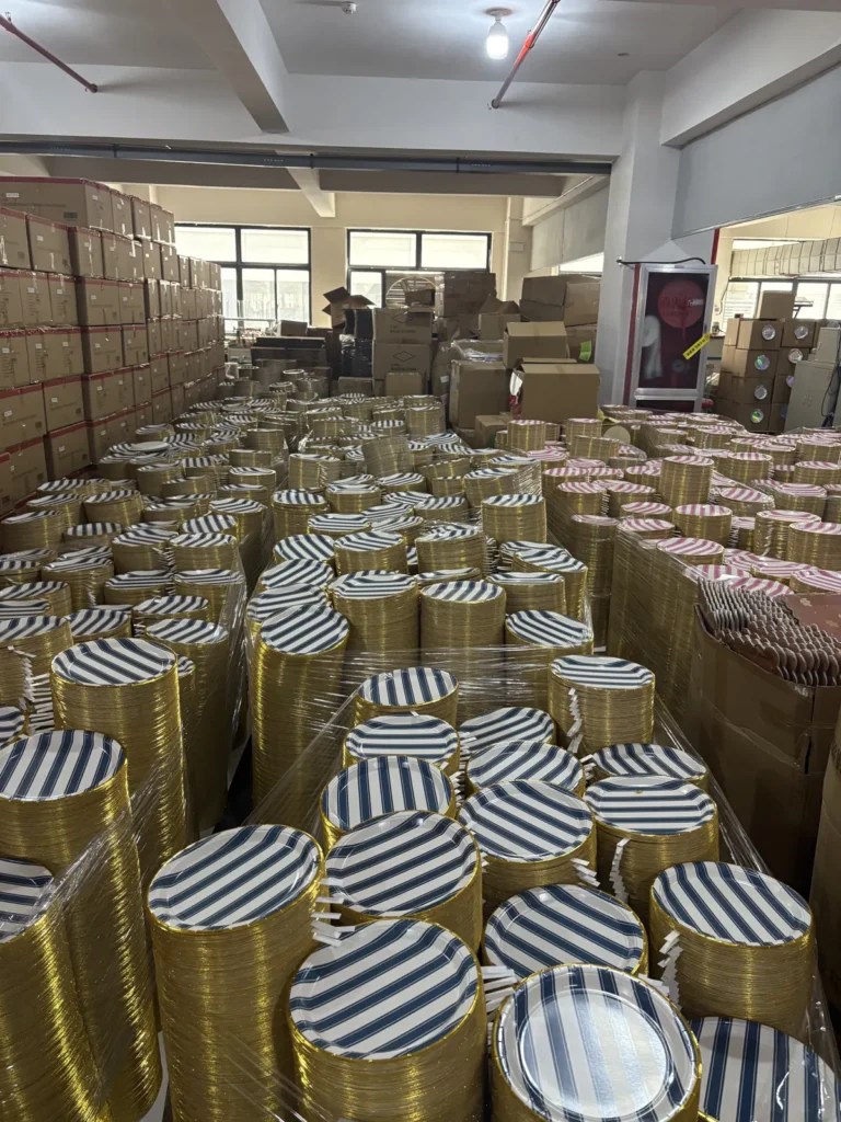Bulk production run of striped gold-foil paper plates