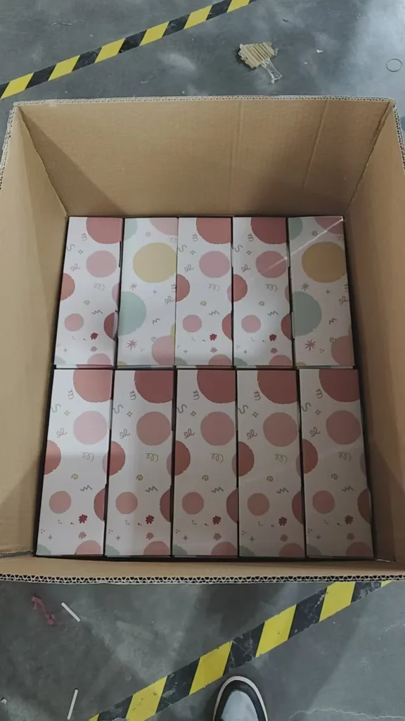 Printed gift-box party packs inside a master carton